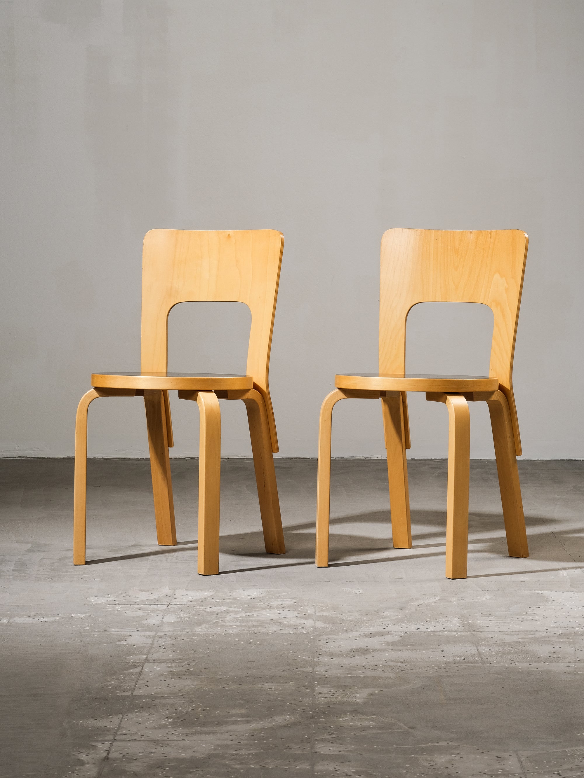Pair of Model 66 Chairs with Black Linoleum Seat by Alvar Aalto for Artek