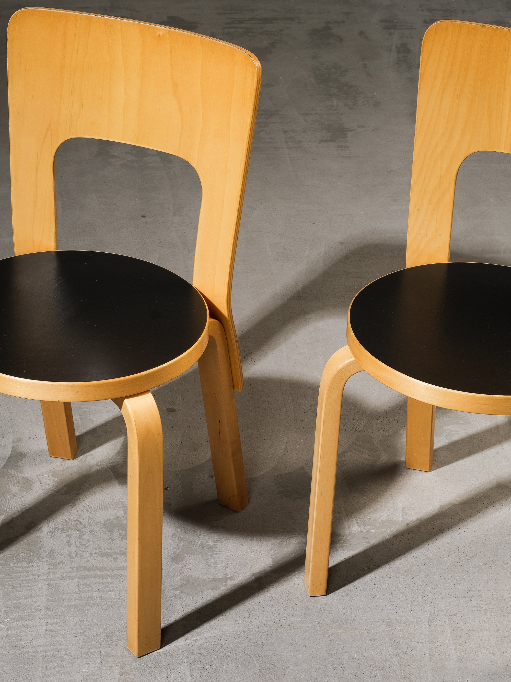 Pair of Model 66 Chairs with Black Linoleum Seat by Alvar Aalto for Artek