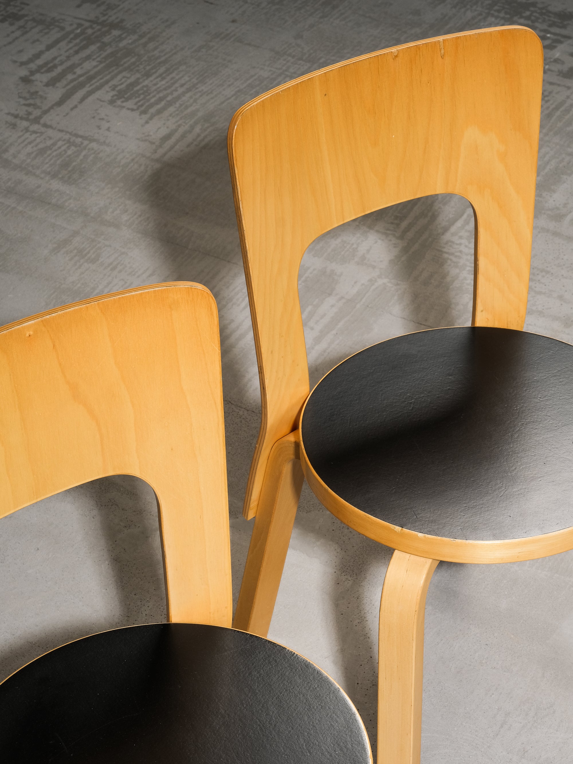 Pair of Model 66 Chairs with Black Linoleum Seat by Alvar Aalto for Artek