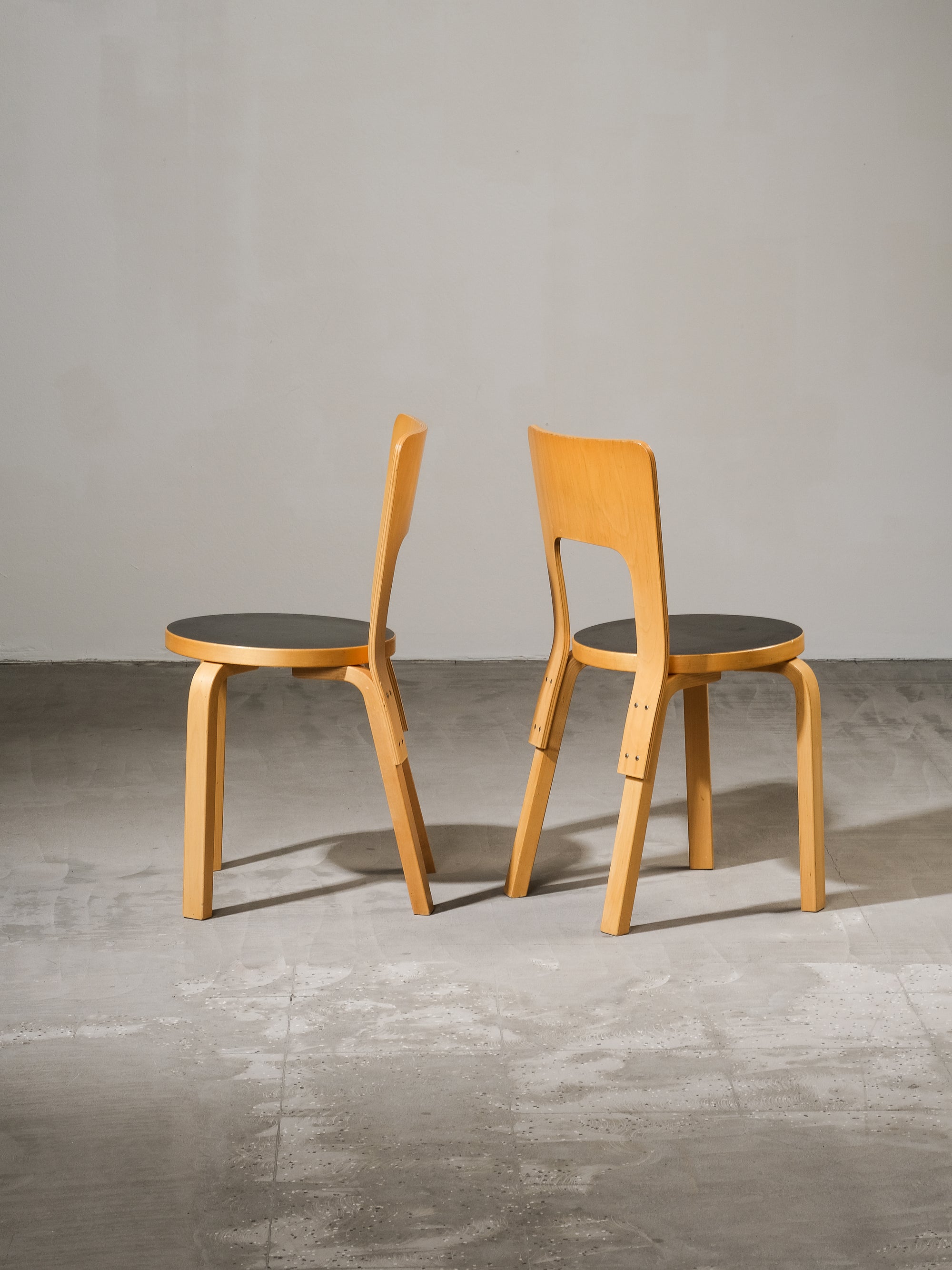 Pair of Model 66 Chairs with Black Linoleum Seat by Alvar Aalto for Artek