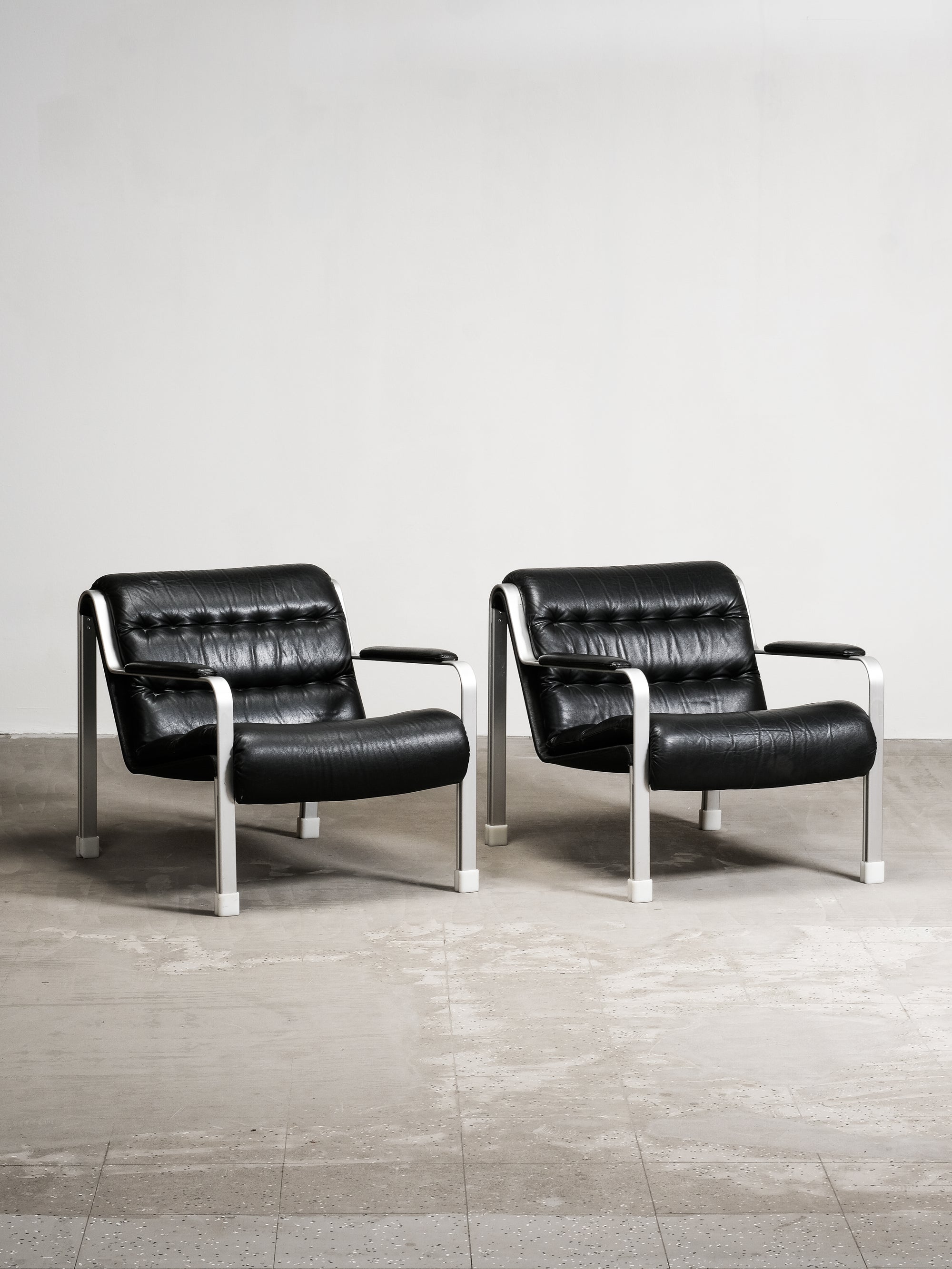 Pair of Leather and Aluminium Lounge Chairs, Sweden, 1970’s