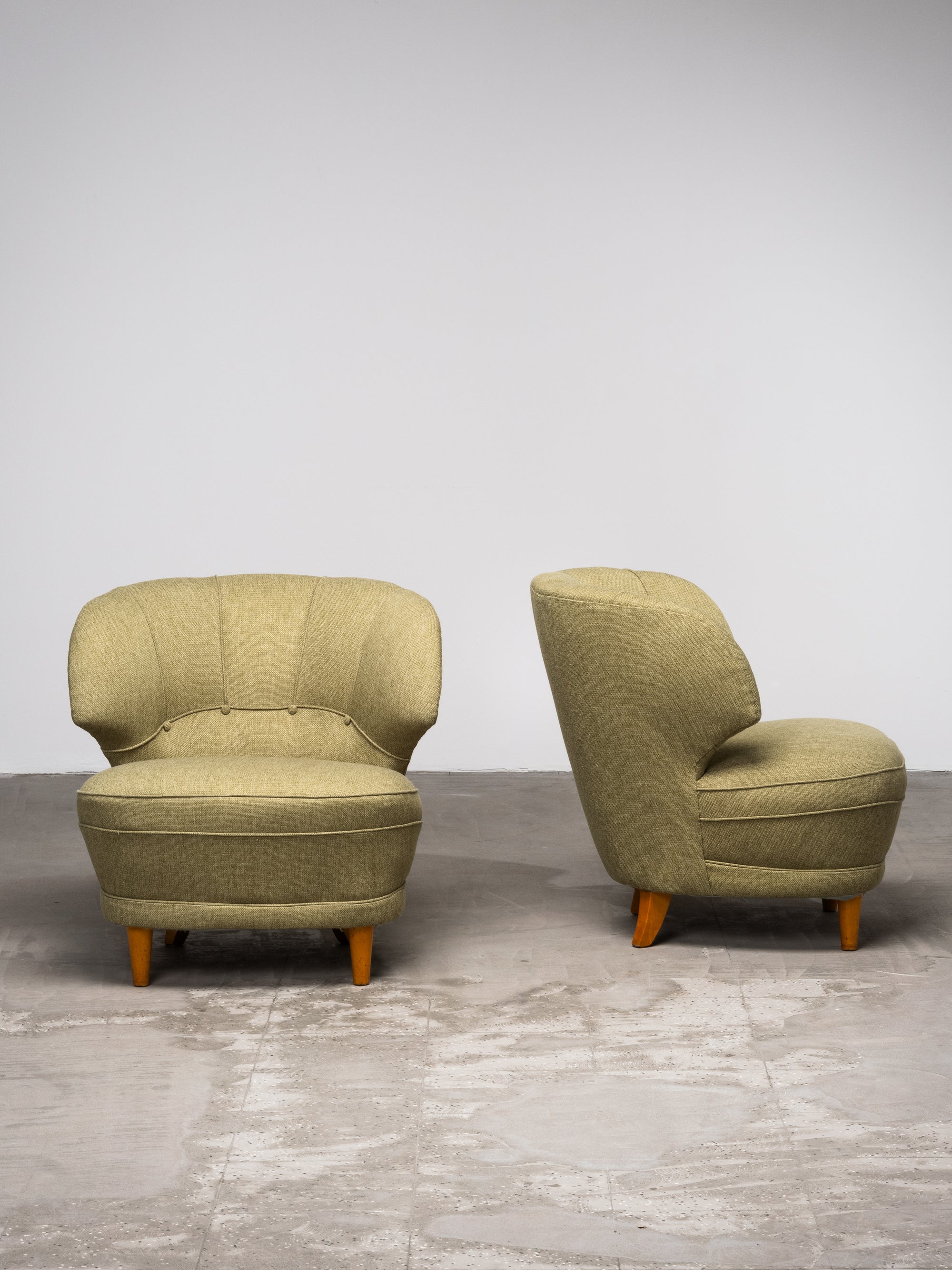 Pair of Carl-Johan Boman Lounge Chairs with Sculpted Back, Finland, 1940s