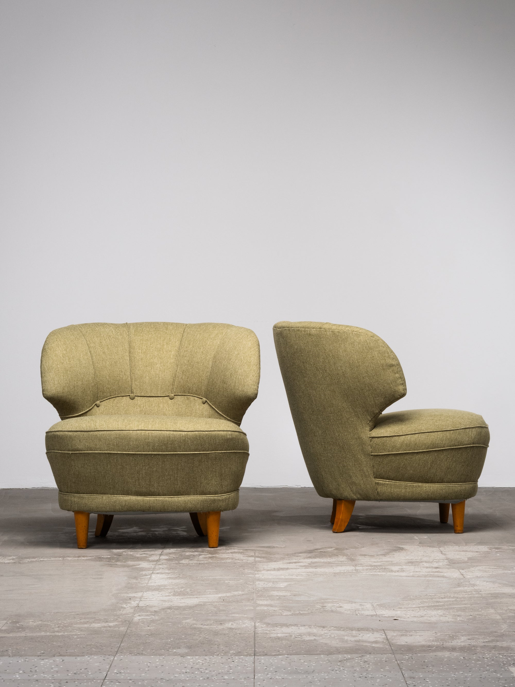 Pair of Carl-Johan Boman Lounge Chairs with Sculpted Back, Finland, 1940s