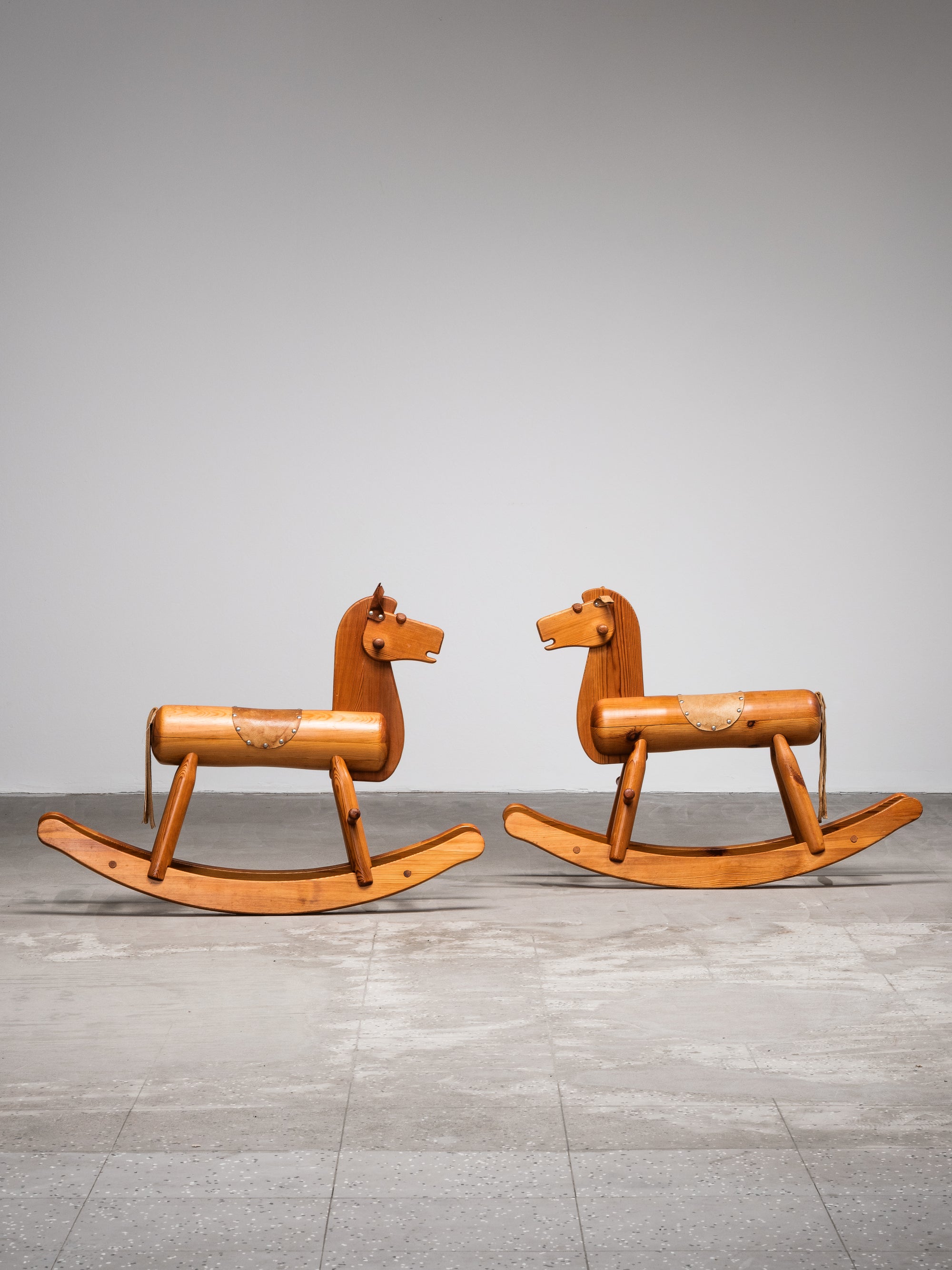 Pair of Solid Pine Rocking Horses with Leather Details, Finland, 1950s