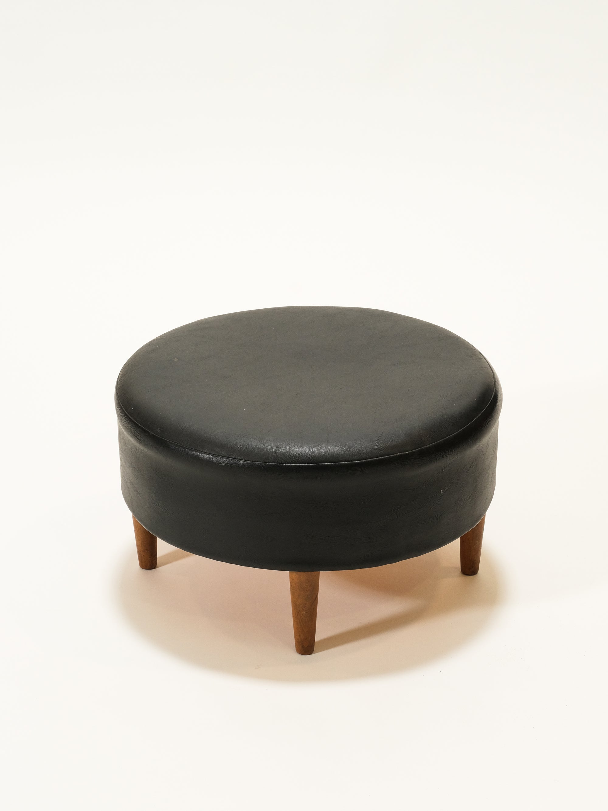 Black Round Leatherette Ottoman / Footstool