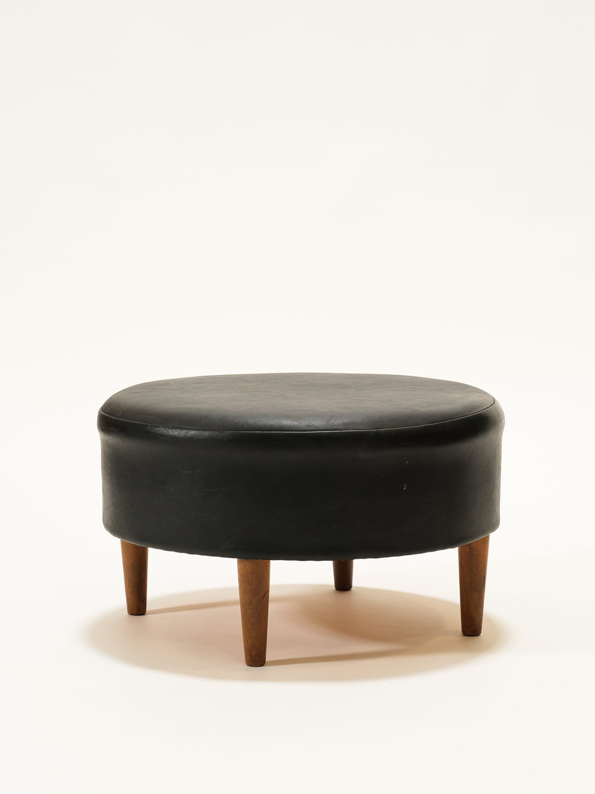 Black Round Leatherette Ottoman / Footstool