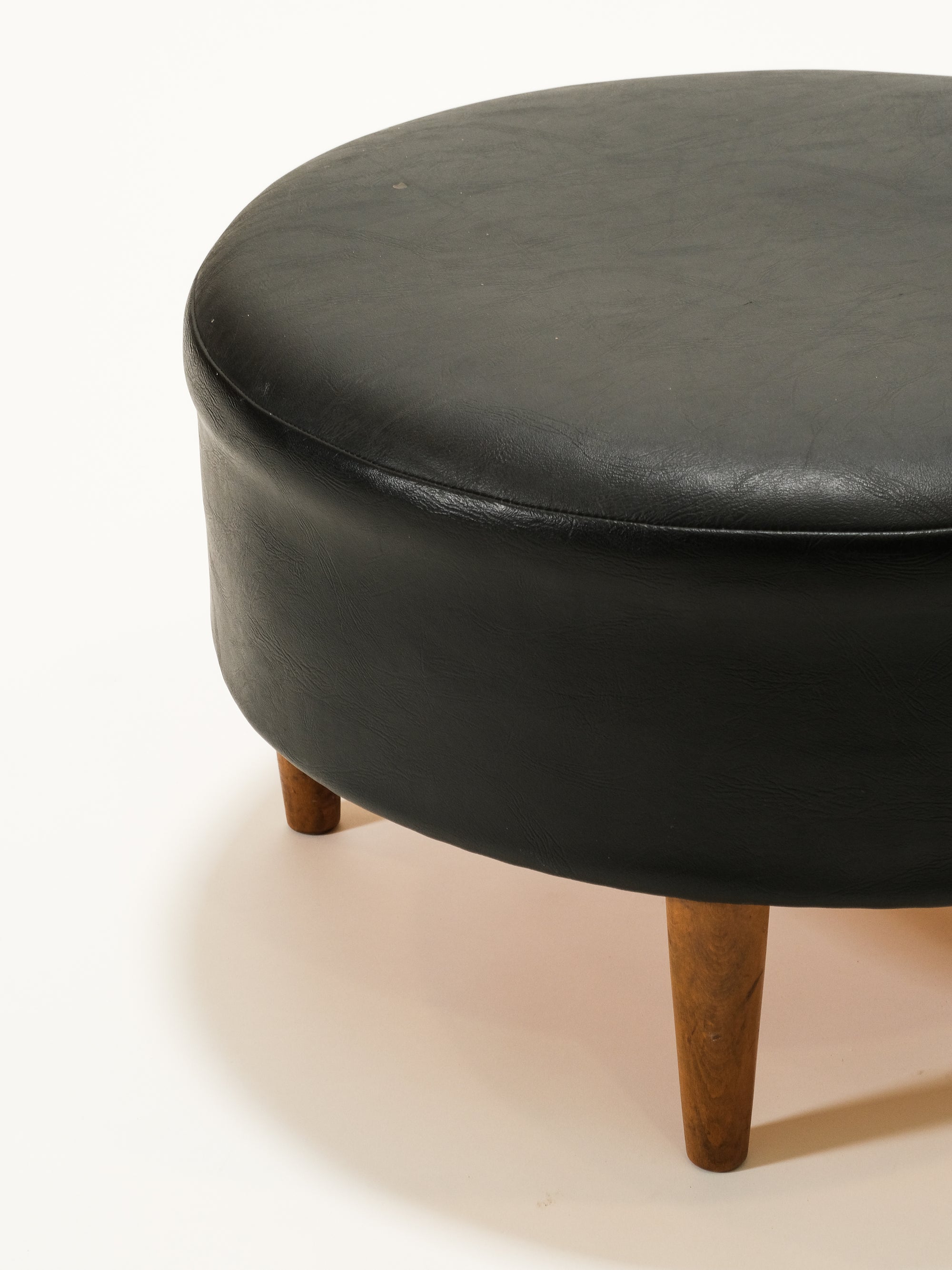 Black Round Leatherette Ottoman / Footstool