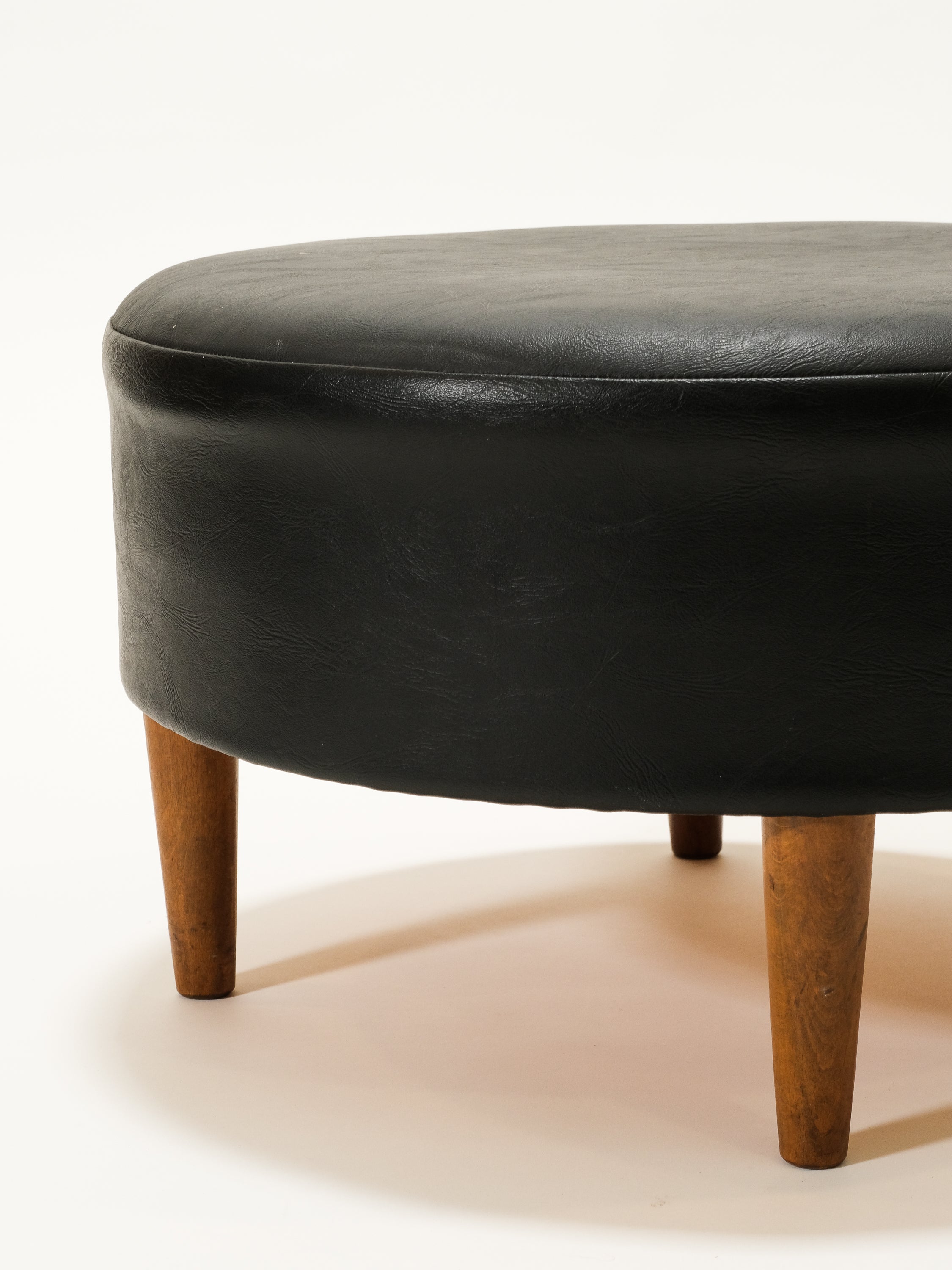 Black Round Leatherette Ottoman / Footstool